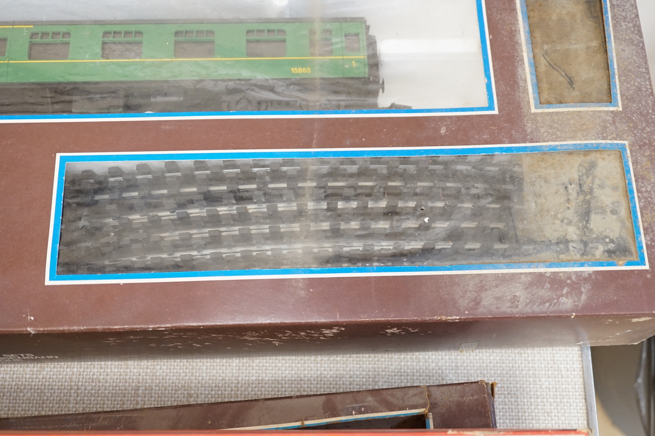 A Lima 0 gauge battery operated train set, together with two additional boxed coaches and a boxed container wagon